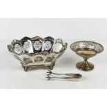 A silver pedestal trinket dish with decoratively pierced rim, 1.4toz, a pair of silver sugar tongs