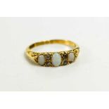 A late Victorian,18ct gold, opal and diamond ring, the three graduated oval opals interspersed
