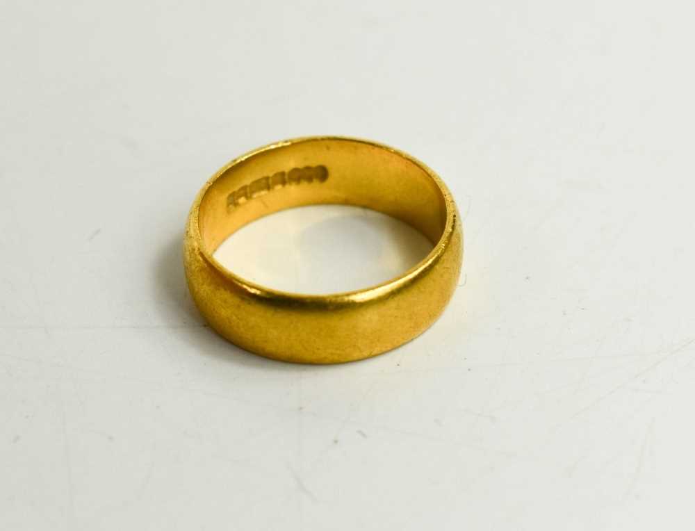 A 22ct gold wedding band, size J/K, 6.13g.