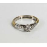 A 9ct gold, platinum and diamond solitaire ring, size P, 2.6g.