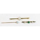 A 9ct gold and opal set bar brooch 7½cm long, the oval opal cabochon 13 by 9mm, 3.73g, a 9ct gold