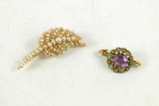 An amethyst and turquoise brooch, unmarked and not testing as gold, 2.75g, 27 by 15mm, the oval