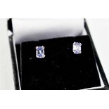 A pair of Tanzanite and white 18ct gold earrings, each tanzanite of approximately 6 by 4mm, 1.3g.