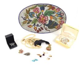 A group of costume jewellery to include a Victorian gilt metal and agate fob, gilt metal cufflinks