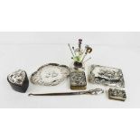 A group of Victorian style silver, including a card case with watered silk lining, dressing table