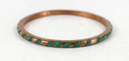 A 9ct gold and malachite set bangle, 31.6g