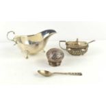 A group of silver to include a sauce boat, mustard pot, screw lid and spoon, 5.17toz.