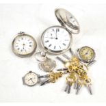Five silver cased wrist and pocket watches, two having white enamel dials, together with a group