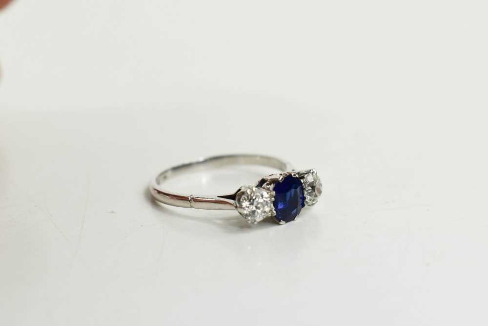 An 18ct white gold, diamond and sapphire ring, the two diamonds 0.3ct each, the cornflower blue - Image 4 of 4