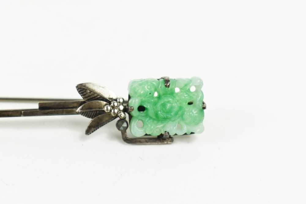 A silver and jade brooch / pin, the rectangular jade plaque pierced and carved, above berries and - Image 2 of 2