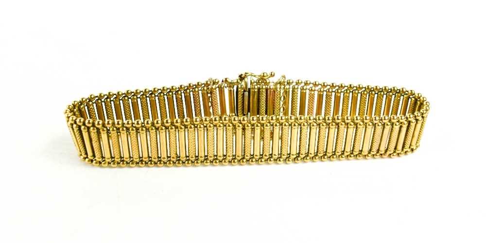 A 9ct gold bracelet, formed with alternating textured and smooth bars, 18.8g. - Image 2 of 2