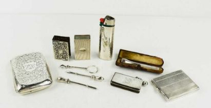 A group of silver smokers accessories including two vintage cigarette holders, two match box