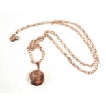 A 9ct rose gold locket with matching belcher chain, total weight 16.9g, 60cm long.