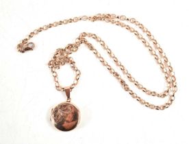 A 9ct rose gold locket with matching belcher chain, total weight 16.9g, 60cm long.