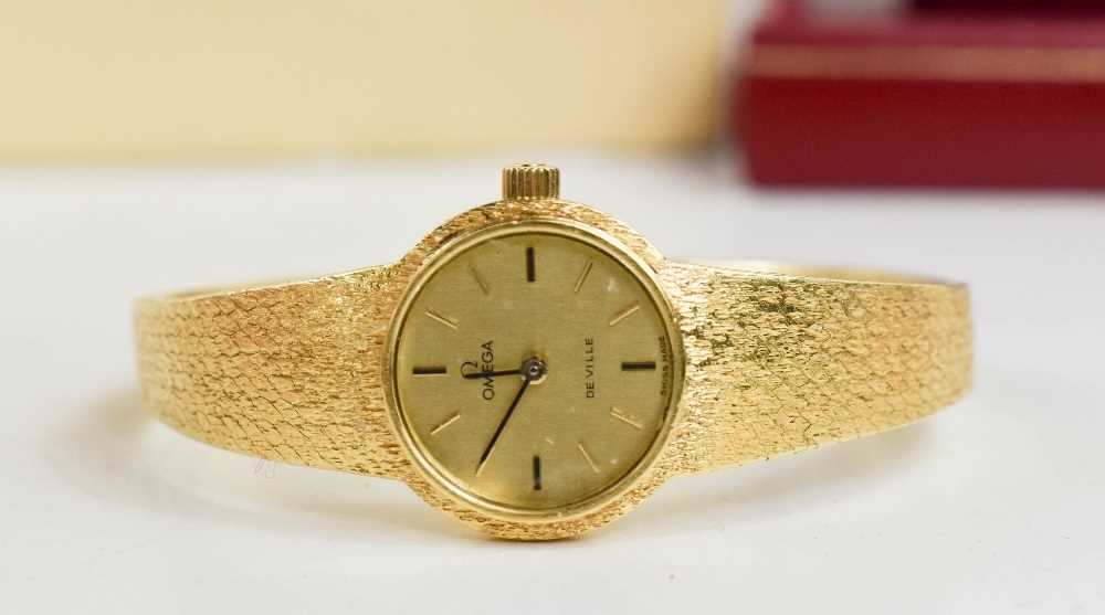 An 18ct gold Omega ladies wristwatch, the circular dial with baton markers, and a 18ct gold bark - Image 4 of 4