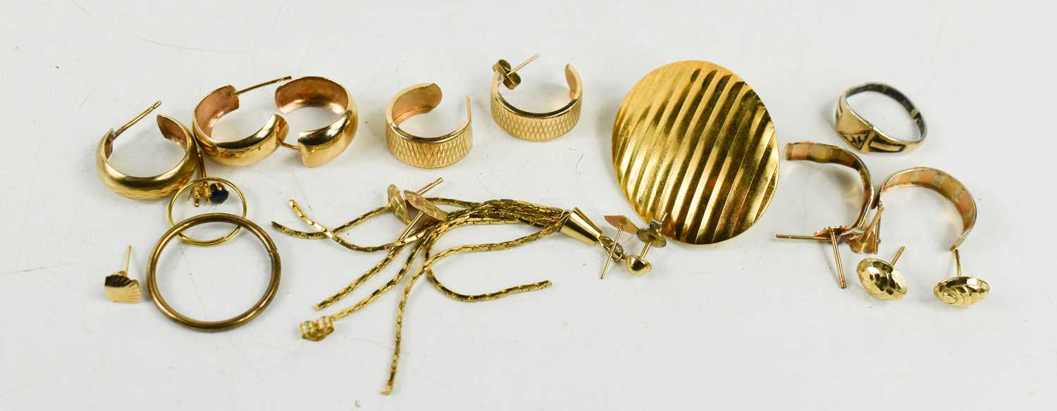 A group of 9ct gold and gold plated earrings, including a pair of planished oval studs, a pair of