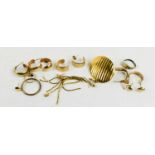 A group of 9ct gold and gold plated earrings, including a pair of planished oval studs, a pair of