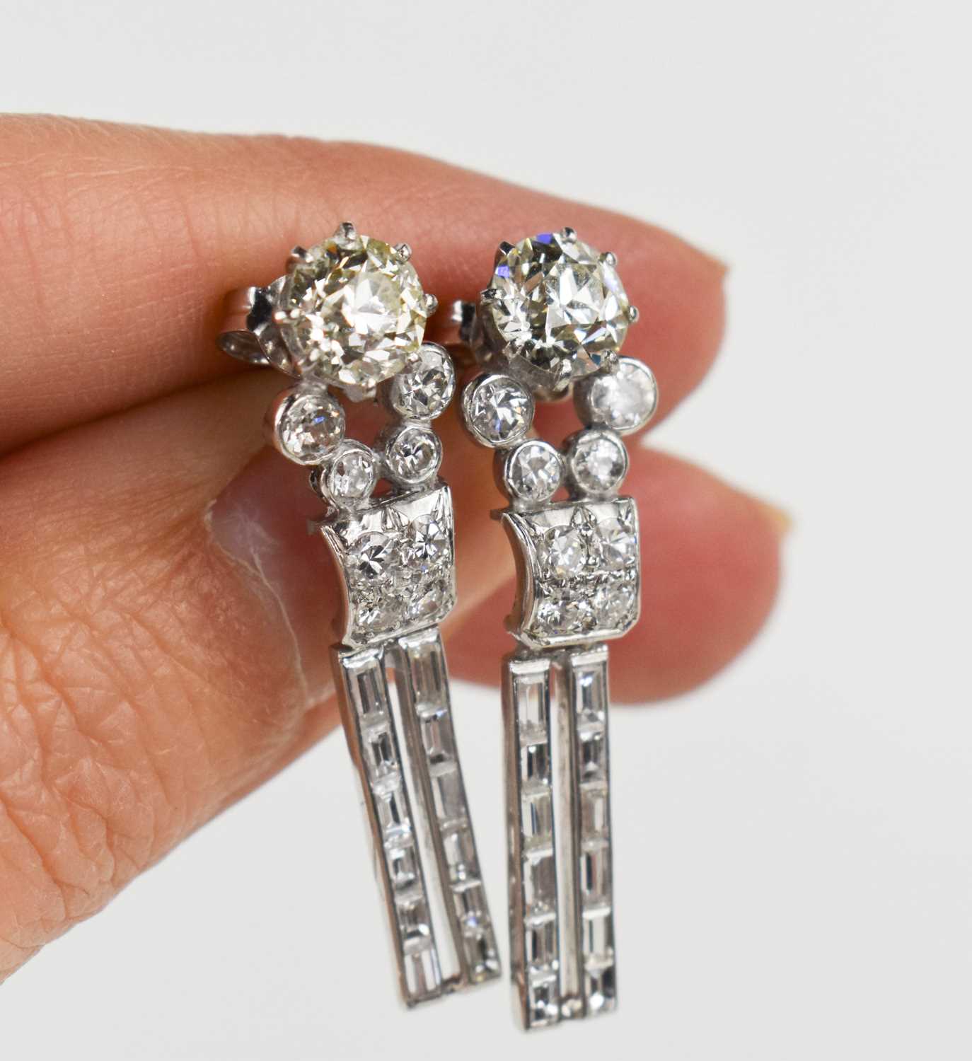 A pair of Art Deco18ct white gold and diamond drop earrings, each of the primary diamonds - Image 6 of 6