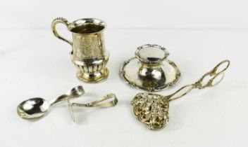 A Victorian silver christening mug, with engraved leaf decoration above a flared gadrooned belly,