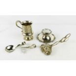 A Victorian silver christening mug, with engraved leaf decoration above a flared gadrooned belly,