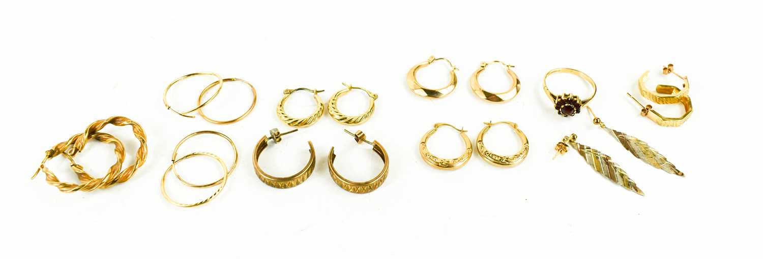 A group of 9ct gold, to include a pairs of earrings; mostly hooped examples, a pair of leaf form