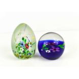 Two Caithness of Scotland glass paperweights: Secret Garden 85/100 and Whitefriars Floral