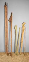 A group of antique fishing rods to include examples by D. Duguid of Aberdeen, A.E Rudge & Son "The