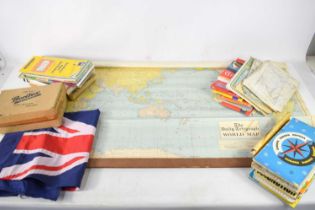 A vintage mid 20th century Daily Telegraph World Map, complete with Steamer Routes, baton mounted