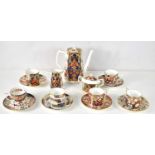 A Royal Crown Derby The Curators Collection coffee set comprising of a coffee pot, cream jug and