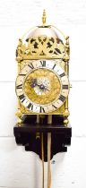 An 18th century Scott of London brass lantern clock, the Roman numeral chapter ring bordering a
