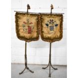 A pair of 19th century brass pole screens, each of twisted column form with tripod base and fleur de