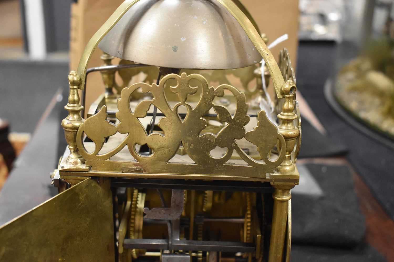 An 18th century Scott of London brass lantern clock, the Roman numeral chapter ring bordering a - Image 12 of 16