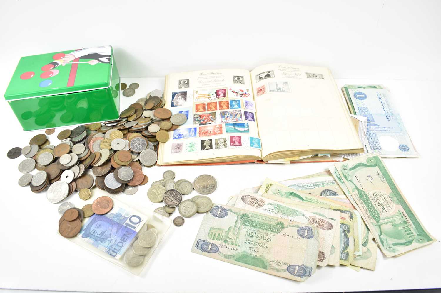 A group of GB and worldwide coins, some silver, together with a quantity of banknotes and stamp