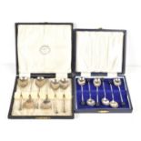 A cased set of six silver teaspoons, hallmarked for London 1925, together with a set of six silver