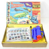 A vintage Chad Valley 'Thunderbirds' Give-A-Show Projector with colour projection slides, in the