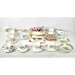 A group of various hand painted and decorative cups and saucers, including a Royal Albert Old