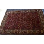 A 20th century Chinese wool rug, hand woven and retailed by the Oriental rug company, central