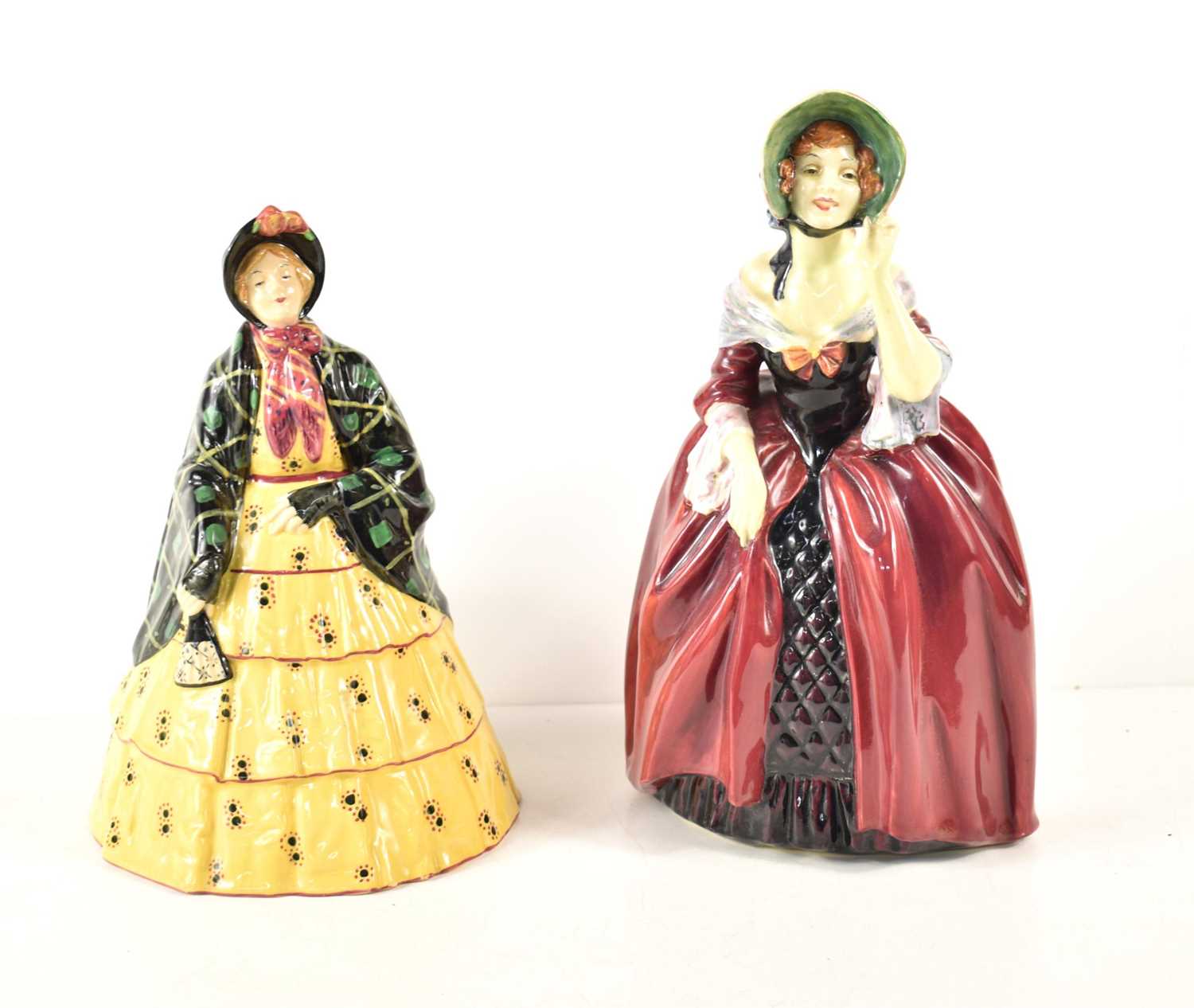 Two Royal Doulton figurines, The Poke Bonnet HN612, 24cm high and Margery HN1413.