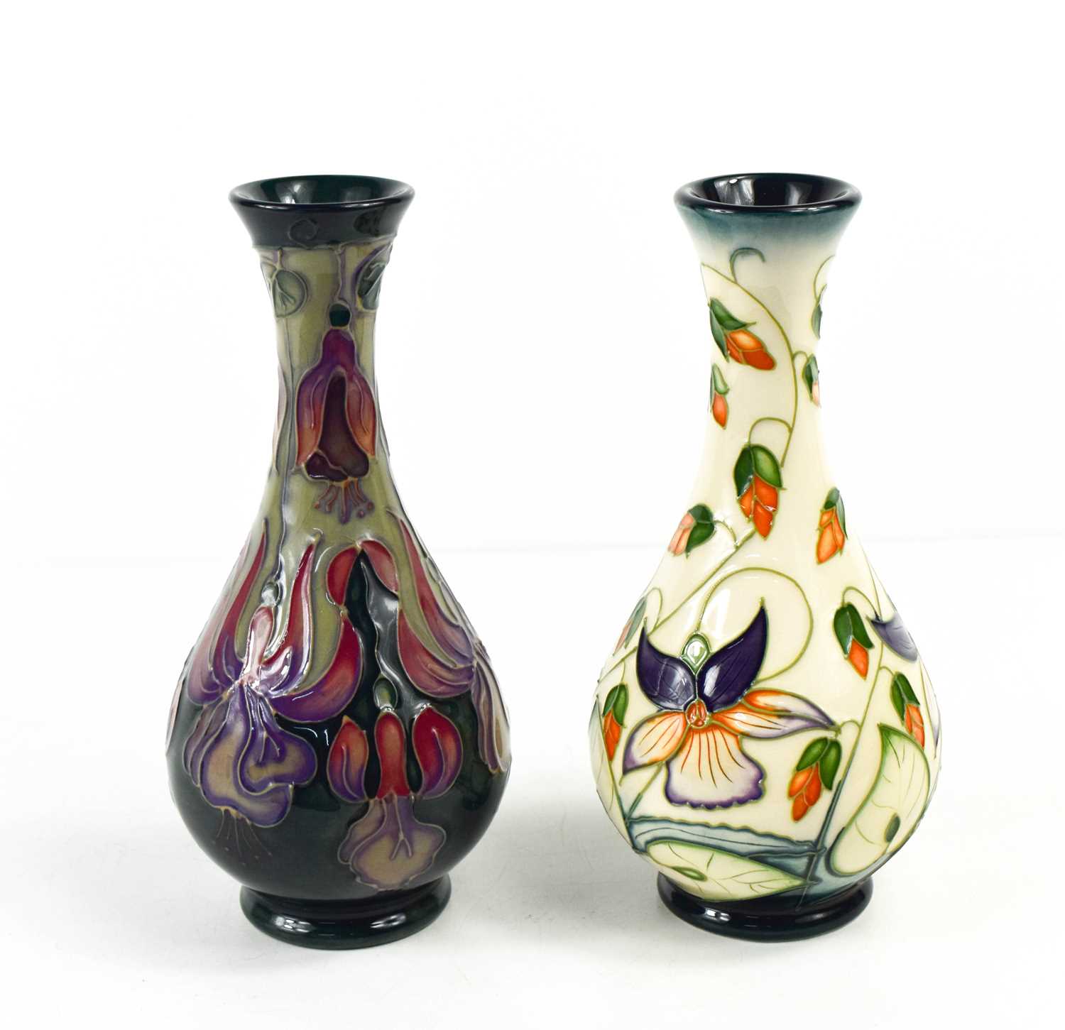 Two Moorcroft vases: a 2022 example, impressed DS to the base together with dates, theother MCC