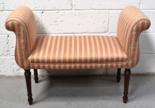 A modern mahogany framed window seat upholstered in cream and orange fabric, 109cm wide.