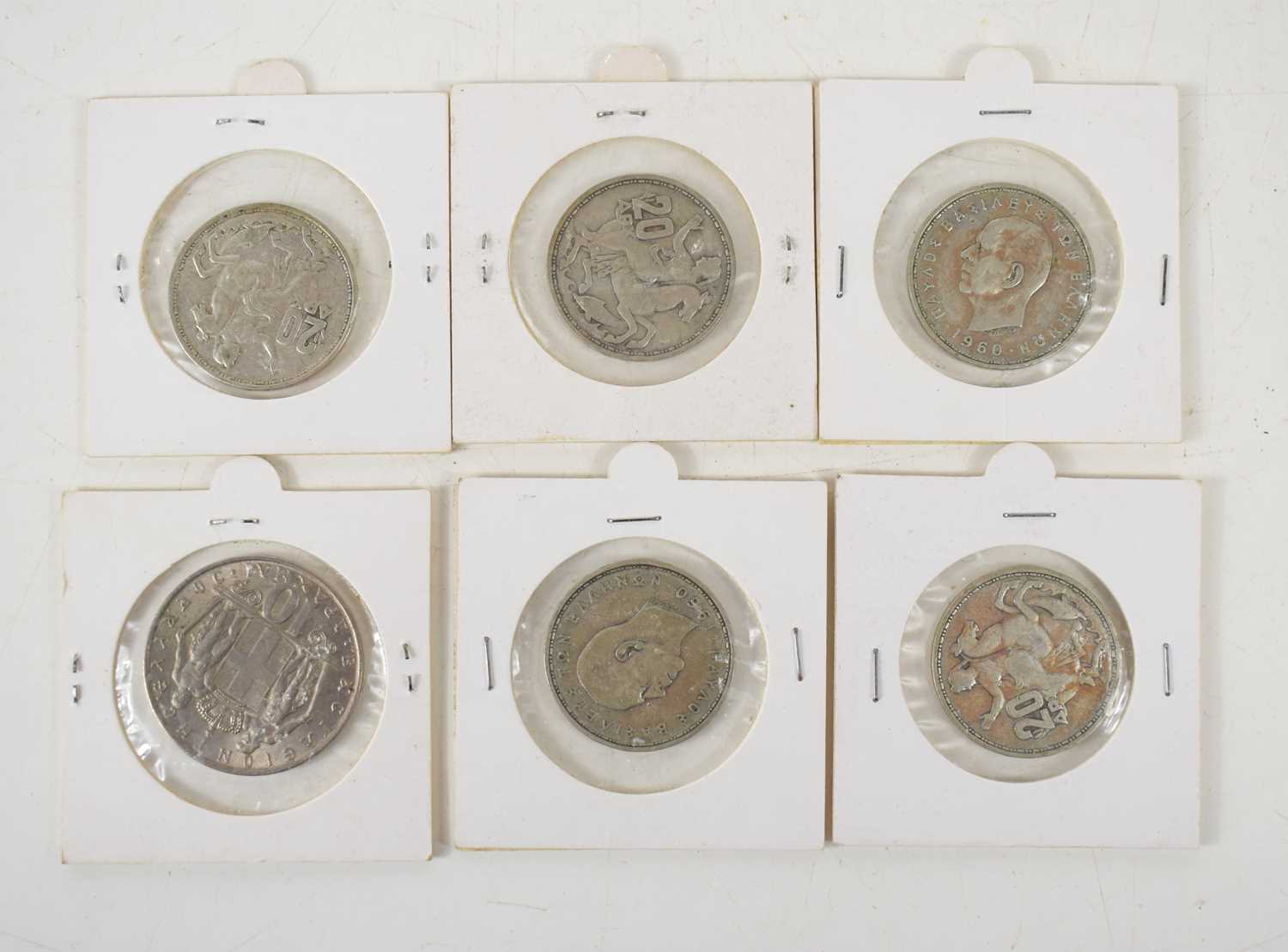 A group of five 1960 835 silver 20 Drachmai coins, and a 1968 10 Drachmai coin.