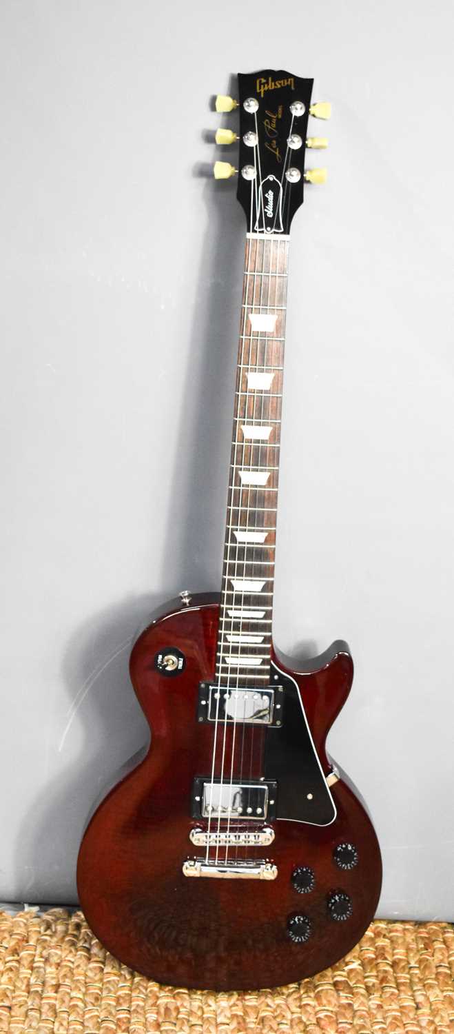 A 2002 Gibson Les Paul Studio guitar, wine red, with Grover vintage tuners and Tone Pros bridge