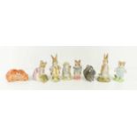 A group of porcelain animal figurines to include Royal Copenhagen squirrel, Royal Albert Mr Benjamin