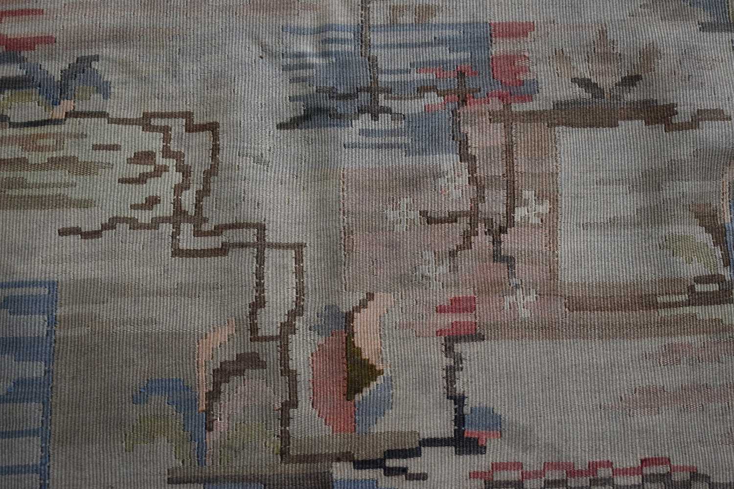 A Turkish wool kelim rug, with abstracted geometric motifs in pastel and neutral tones, with cream - Image 2 of 2