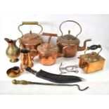 A group of copper and brassware to include kettles, tankard and jug together with a Kukri knife