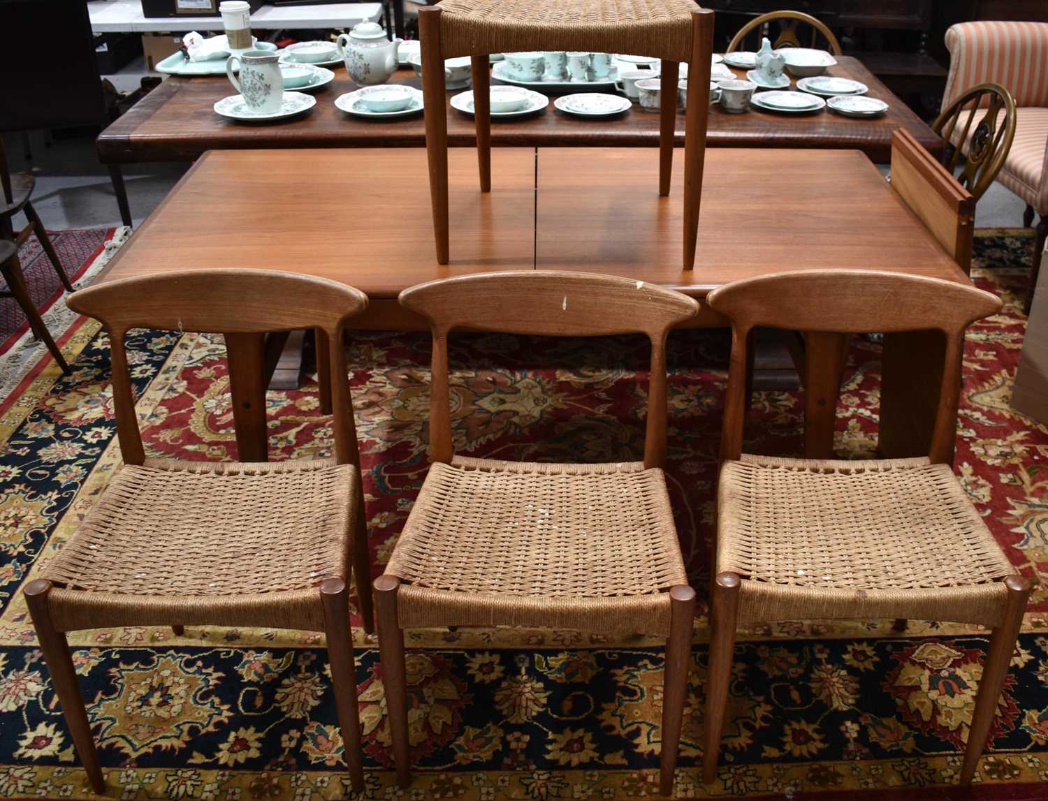 A set of three Mid-Century Danish Morgen- Kohl dining chairs and a stool which has been cut down