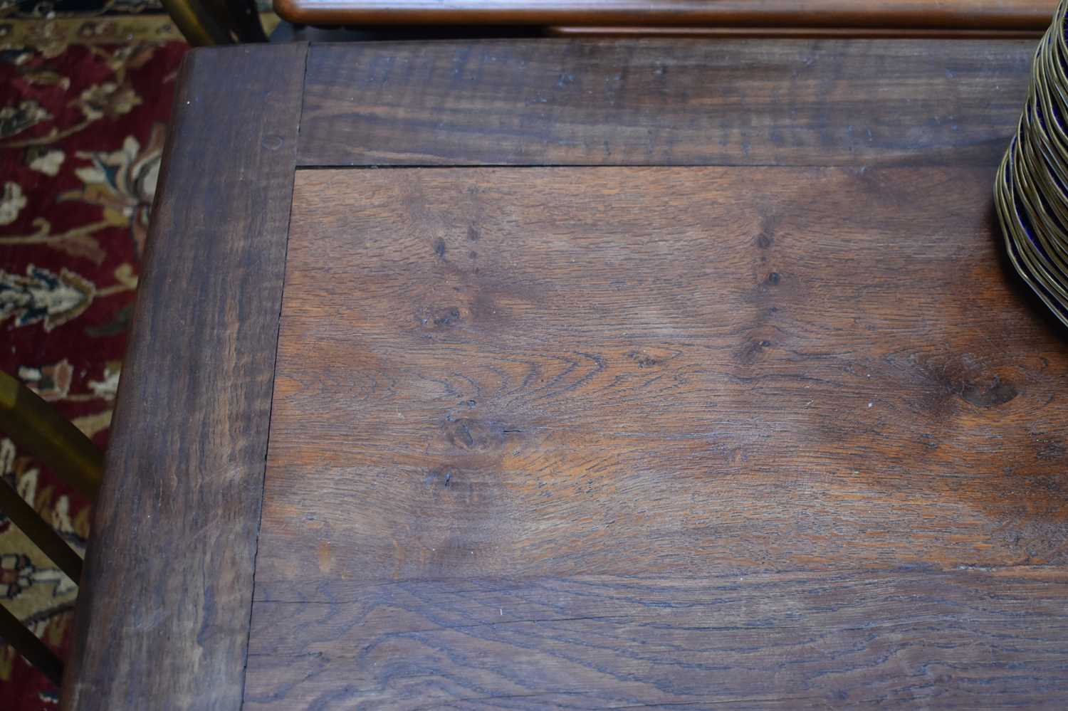 A solid oak 17th century style trestle table, the reclaimed cleated planked top above double - Image 6 of 10