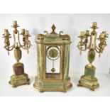 A German clock garniture in the neo-classical style, the clock with Hettich movement, green onyx and
