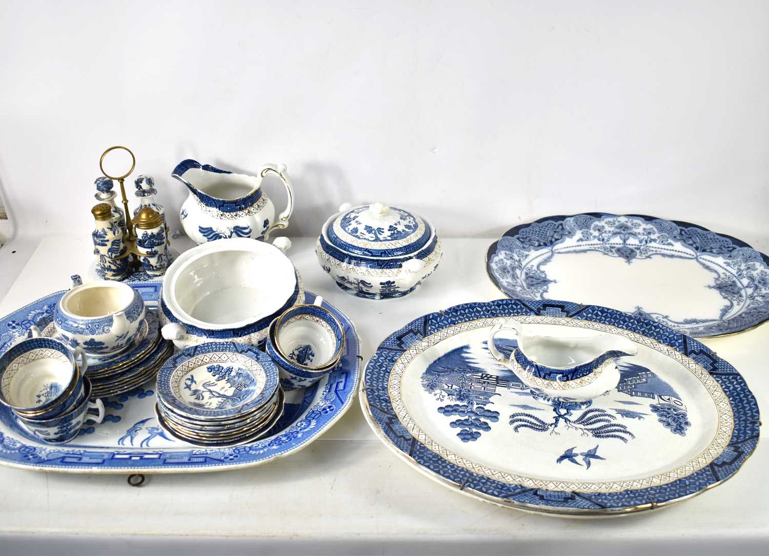 A group of blue and white porcelain 19th century and later, including two large willow pattern