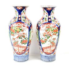 A pair of late 19th century Chinese vases, decorated in the Imari colourway with panels of birds